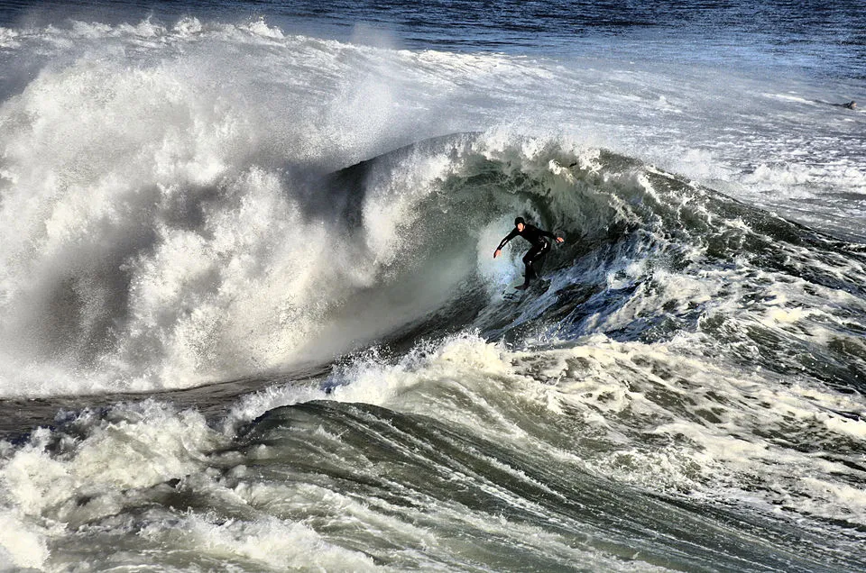 Surfer catching a wave in Ecuador